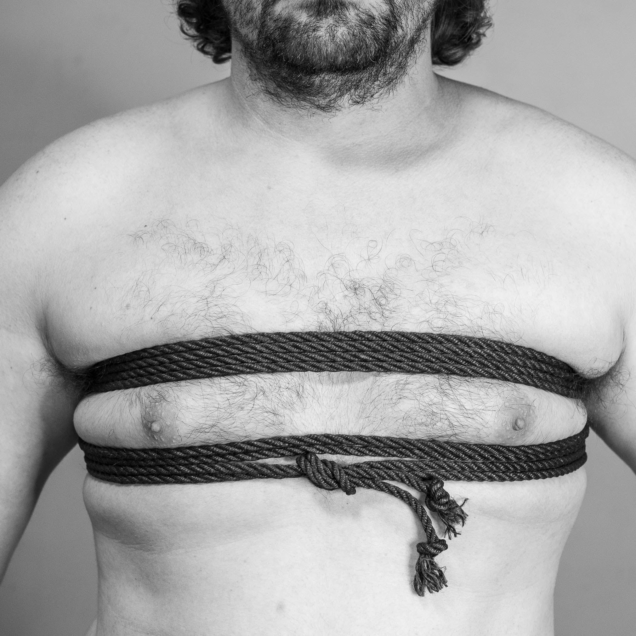 Basic shibari harness, on chest.  Step by step tutorial