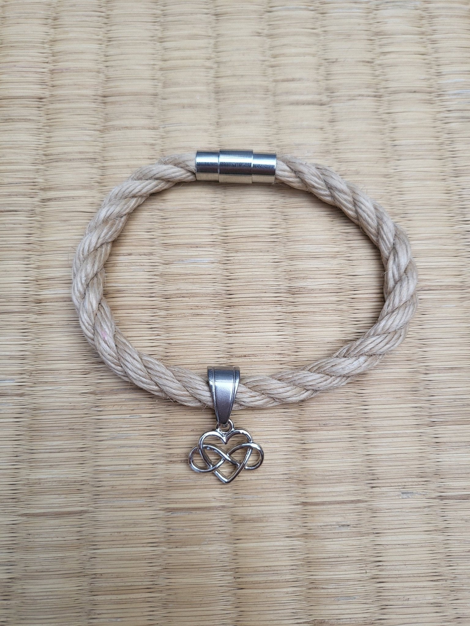 Polyamory bracelet made with jute Shibari rope. - RebornRopes