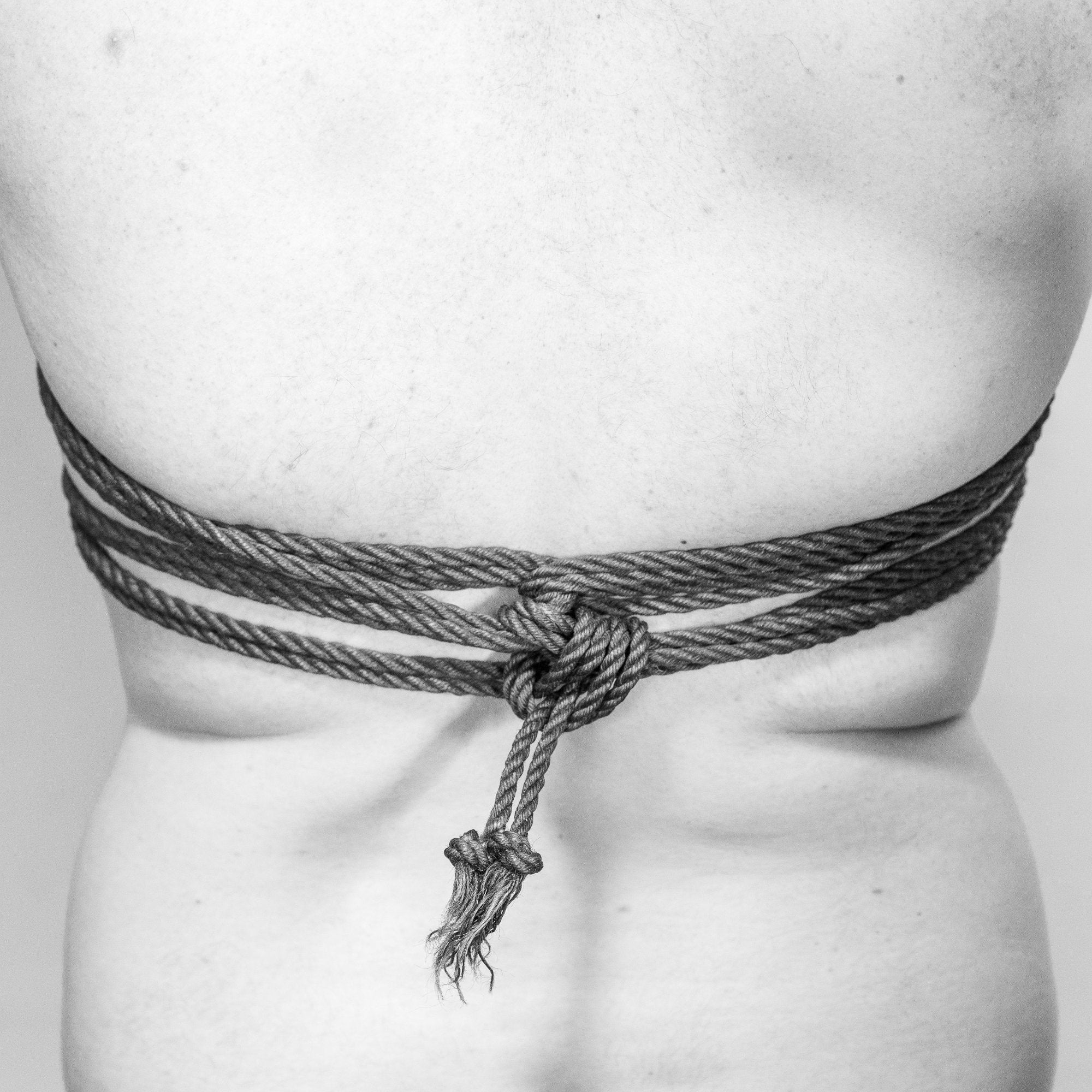 Chest Harness guide to tieing shibari, using a jute shibari rope.  Reborn Ropes